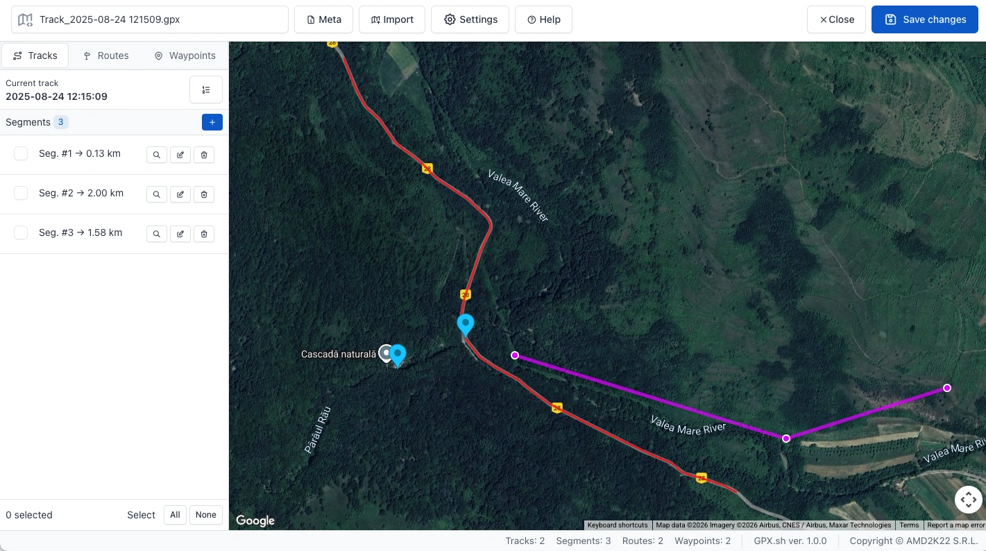Map displaying red track segments, purple routes, and blue waypoint markers